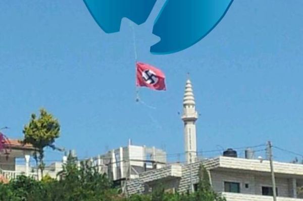 הוסר דגל 'צלב הקרס' שהתנוסס בבית אומר ליד חברון