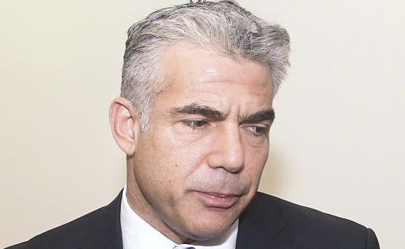 לפיד תוקף: פרסום המכרזים לבנייה ביו"ש – טעות כפולה