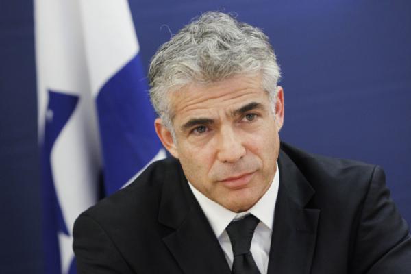 לפיד על האיומים נגדו ברצח: "מי שמאמין לא מפחד"