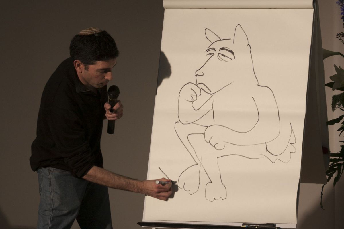 שי צ'רקה מרצה בציורים על כלב השמירה של הדמוקרטיה