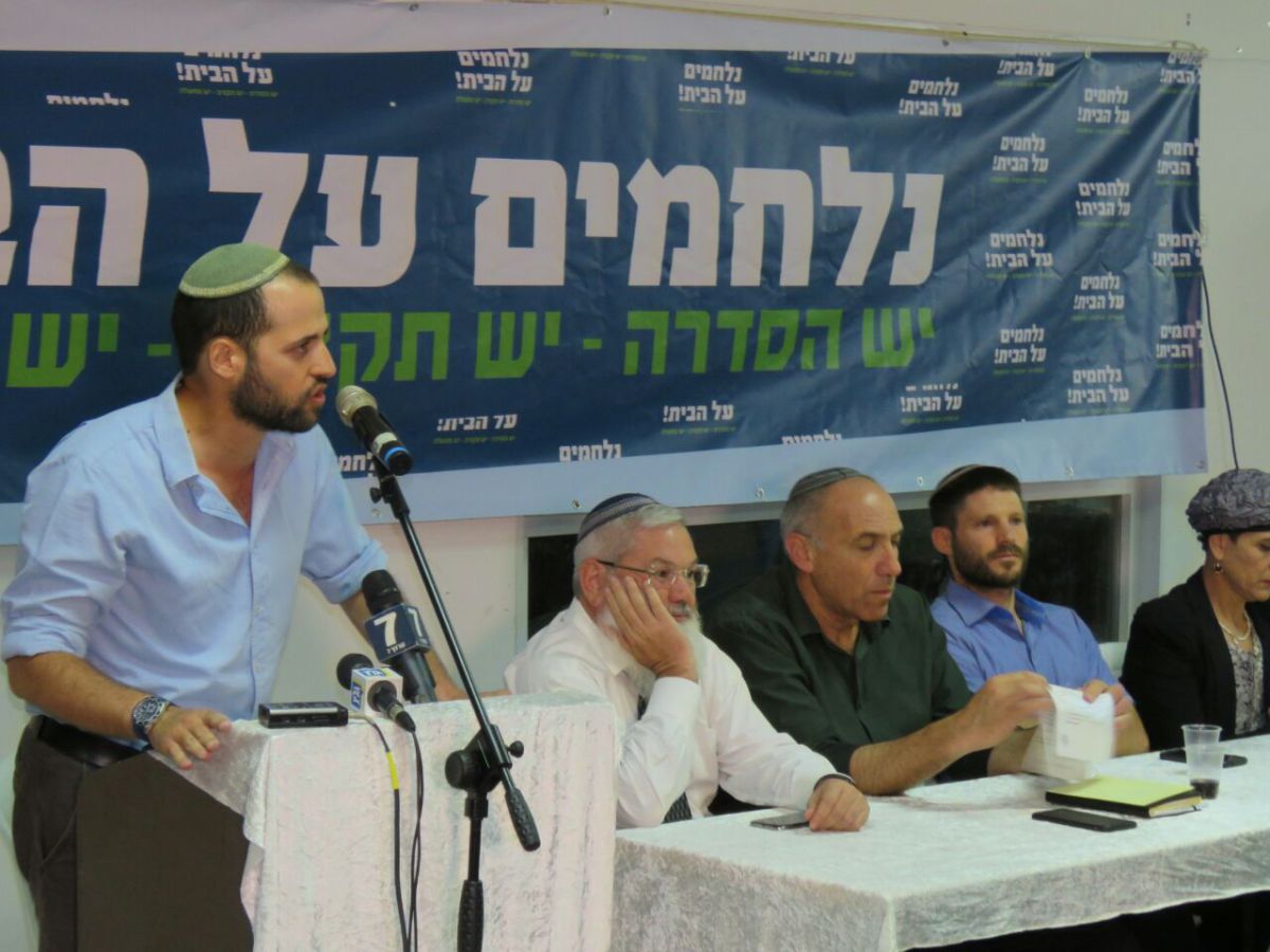 מהומה בעמונה: פעילים הורידו את בן דהן מהבמה