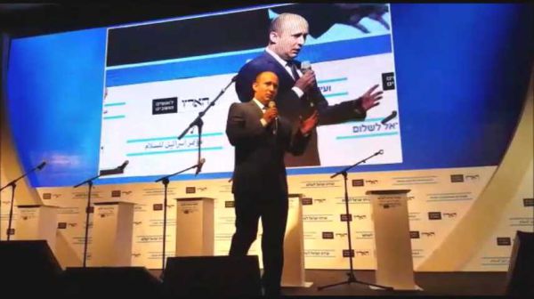 בנט הותקף בועידת הארץ: "אתה נאצי". צפו