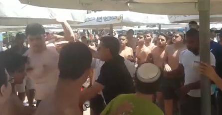 צפו: קטטה המונית בימית 2000