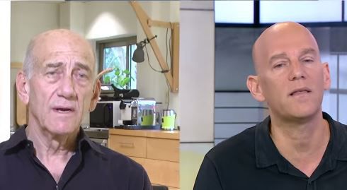 עימות סוער בין גיא פלג לאולמרט: "יהיר וחוצפן".צפו