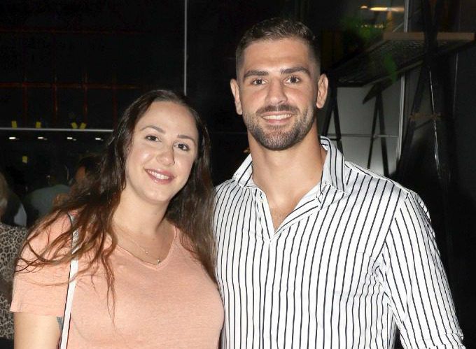 אלוף אולימפי וקורא ספרים: פיטר פלצ'יק ואישתו בהשקה