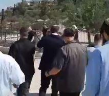 כהנא הותקף באזכרה של הרב קוק: "צא, טמא". צפו