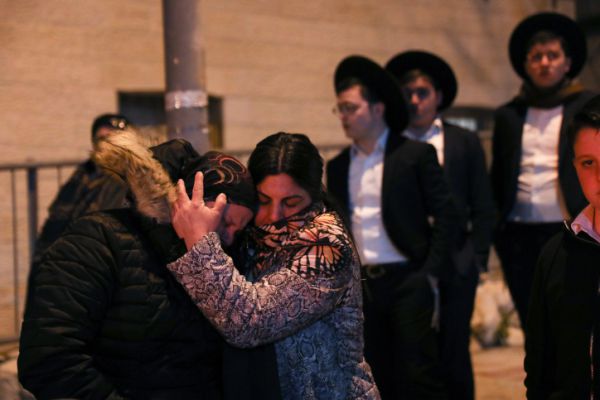 "קורבן בחזרה": נרצחי הפיגוע בי-ם הובאו למנוחות