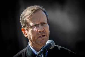 חודש וחצי אחרי הטבח: הרצוג יצא לביקור מדיני באוסטרליה