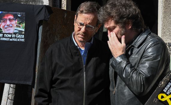 הרצוג ונשיא ארגנטינה בניר עוז: "מזכיר את זוועות השואה"