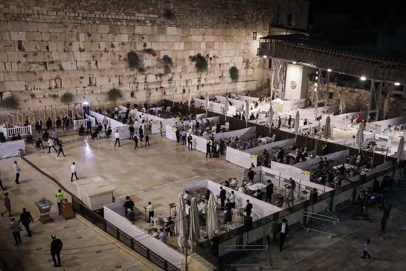 הלכות יום הכיפורים שחל בשבת למנהגי כל העדות