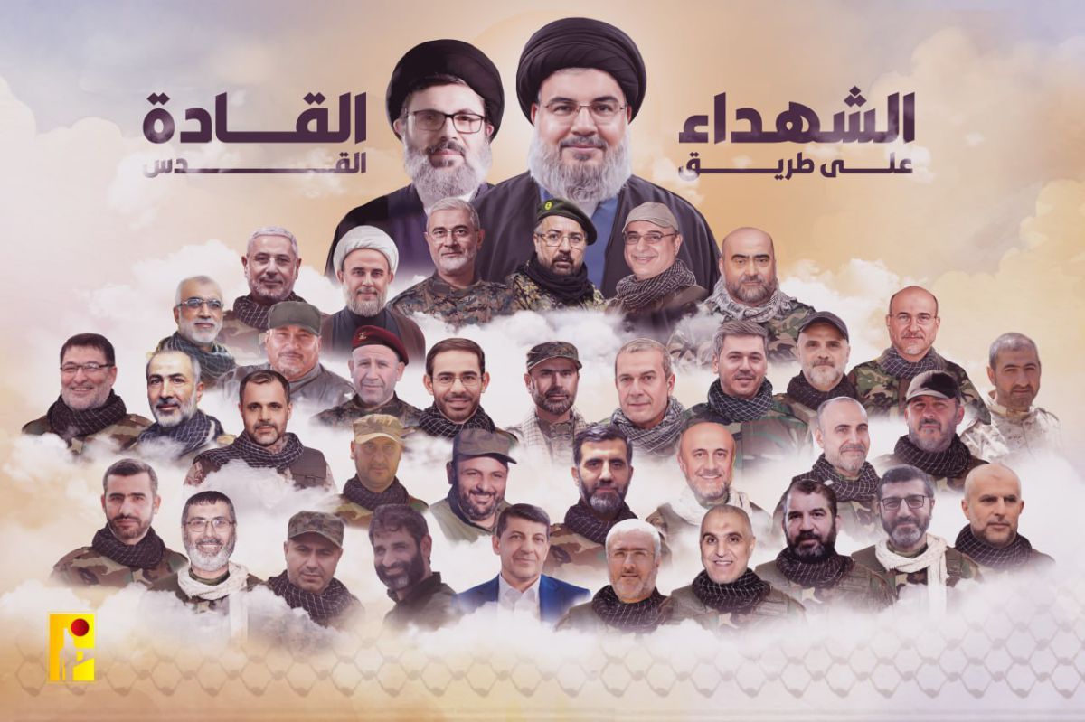 קישוט לסוכת האבלים: פוסטר עם בכירי חיזבאללה שחוסלו