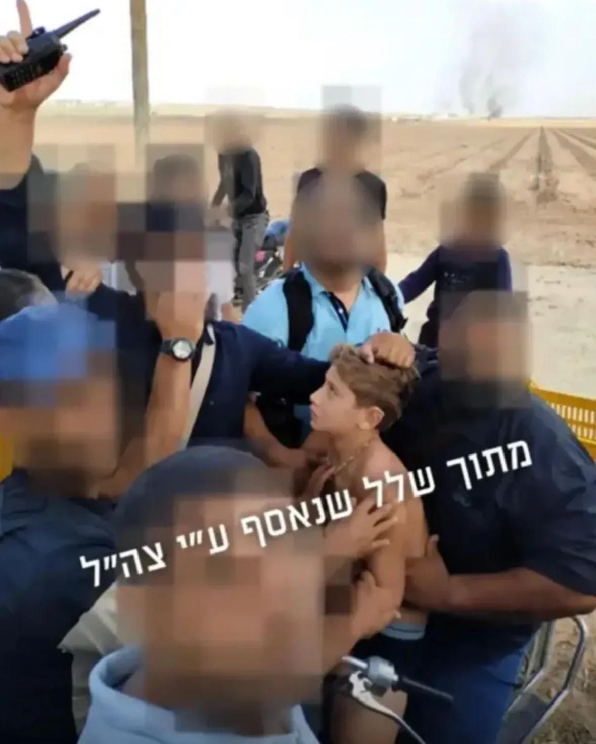 תיעוד מזעזע: עשרות מחבלי חמאס מלטפים את יגיל יעקב