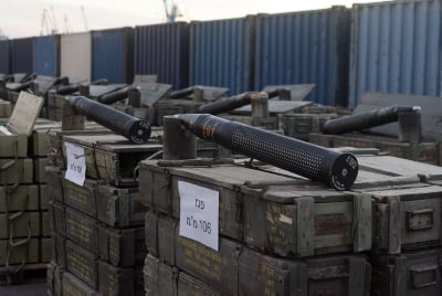 Israeli military police stand guard next to part of the weapon cargo that was found on the ship the Francop, in the port in Ashdod Israeli military police stand guard next to part of the weapon cargo that was found on the ship the Francop, in the port in A