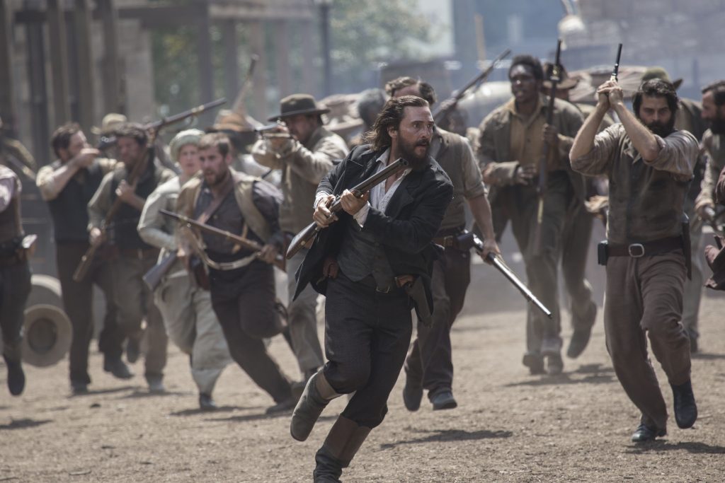 Newt (Matthew McConaughey) and his men storm into downtown Ellisville