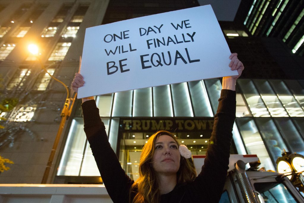 People take part at a protest against elected president Donald Trump, outside the Trump Tower in Manhattan, New York, November 9, 2016. Photo by Noam Revkin Fenton/Flash90 *** Local Caption *** הפגנה מנהטן טראמפ בחירות ארהב ארצות הברית צעדה צועדים מפגינים