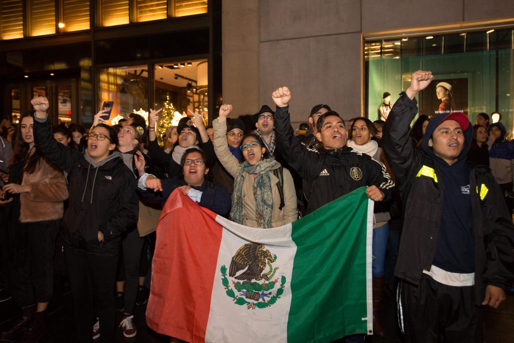 People take part at a protest against elected president Donald Trump, outside the Trump Tower in Manhattan, New York, November 9, 2016. Photo by Noam Revkin Fenton/Flash90 *** Local Caption *** הפגנה מנהטן טראמפ בחירות ארהב ארצות הברית צעדה צועדים מפגינים
