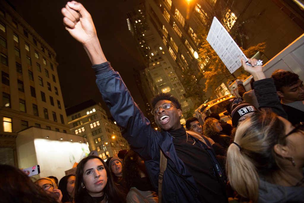 People take part at a protest against elected president Donald Trump, outside the Trump Tower in Manhattan, New York, November 9, 2016. Photo by Noam Revkin Fenton/Flash90 *** Local Caption *** הפגנה מנהטן טראמפ בחירות ארהב ארצות הברית צעדה צועדים מפגינים
